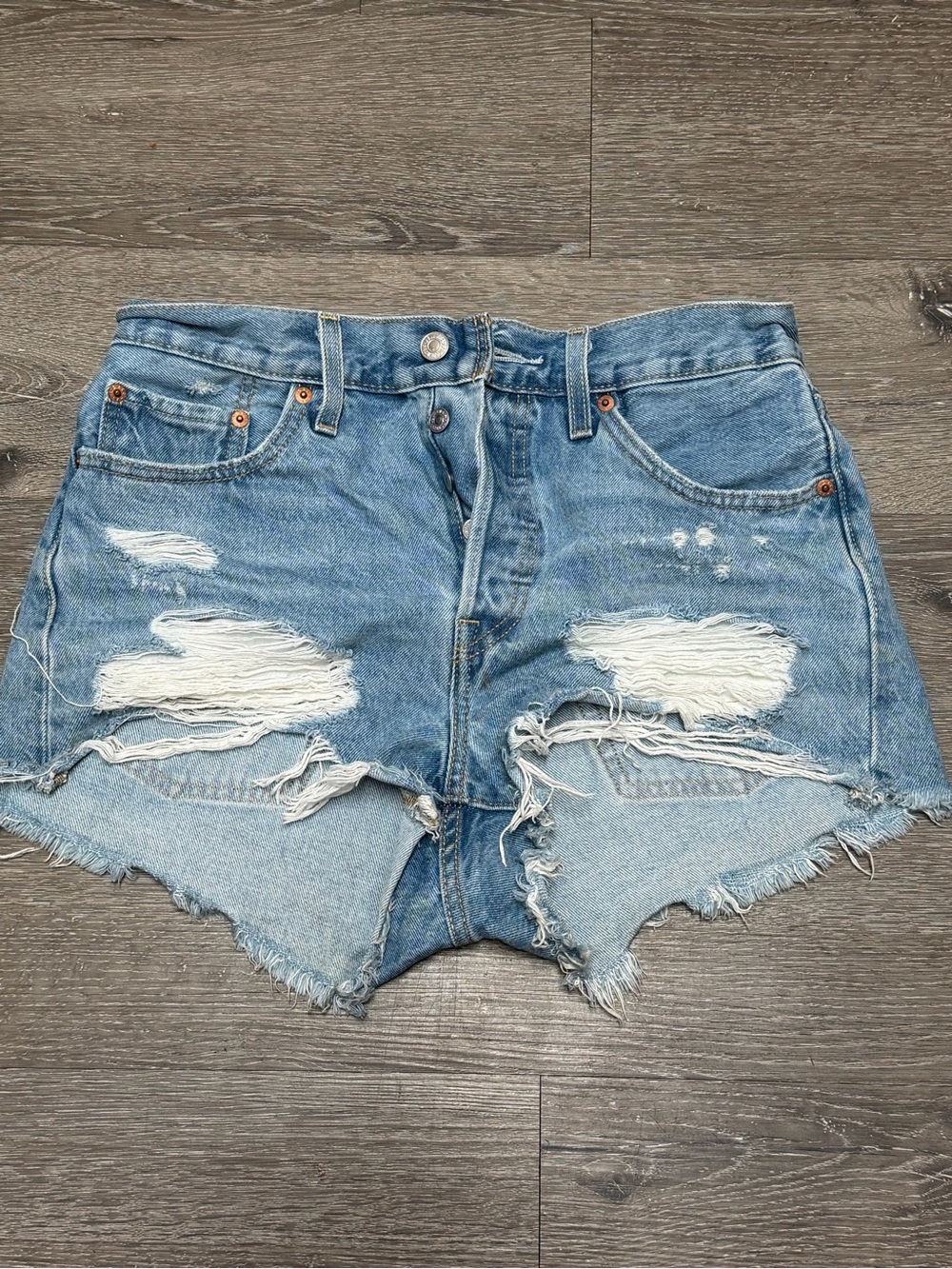 High-Rise Light Blue Distressed Denim Cutoff Shorts